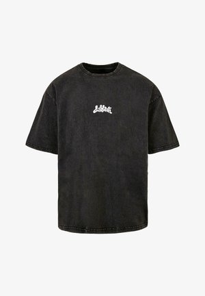 Must värvi puuvillane T-särk, lahtise lõikega, lühikeste varrukatega ja ümmarguse kaelusega. Rinnal on valge "Loss Youth" logo.