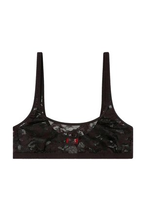 Bralette in pizzo nero con spalline larghe e scollo arrotondato. Presenta un motivo floreale sottile e un piccolo dettaglio con logo rosso sul davanti.