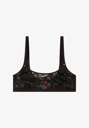 Bralette in pizzo nero con spalline larghe e scollo arrotondato. Presenta un motivo floreale sottile e un piccolo dettaglio con logo rosso sul davanti.