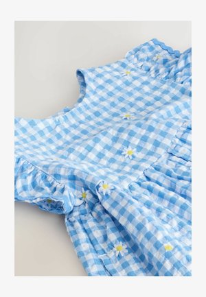 Zils ginghemas kleita ar volāniem piedurknēs, ar mazu dzeltenu un baltu puķu izšuvumu, izgatavota no viegla, teksturēta kokvilnas auduma.