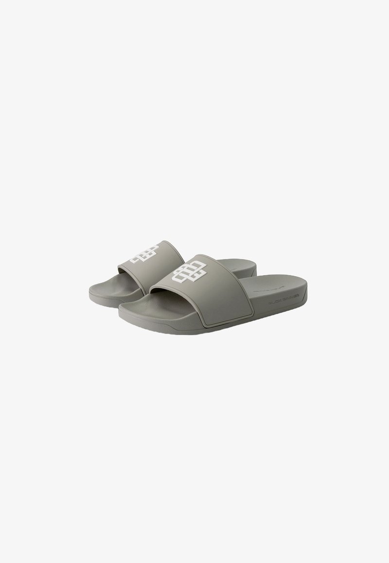 Gray slide sandals made of rubber, featuring wide straps with a white geometric logo and a comfortable flat sole.