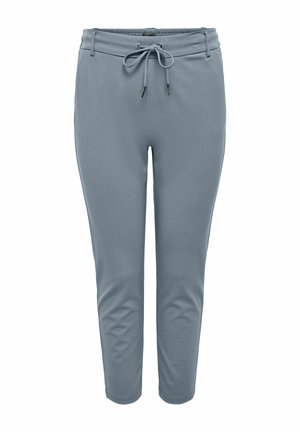 Gaiši zili sporta bikses ar elastīgu vidukļa joslu, aukliņu detaļu un šaurākām kāju daļām. Izgatavotas no mīksta, elastīga auduma, piemērotas ikdienas valkāšanai.