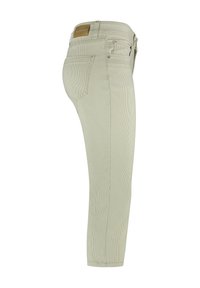  Lichtgroene, strak zittende jeans met een verticale krijtstreep patroon, vijf zakken en een leren taillebandlabel. Middenhoogte ontwerp met taps toelopende pijpen.