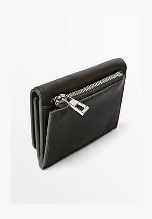 Black leather wallet with a zipped compartment and silver hardware. Features a smooth texture and a compact, folded design.