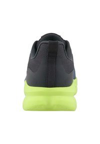 Chaussure de sport noire avec tige en maille grise, dotée d'une semelle amortissante vert fluo et d'une languette à l'arrière pour un enfilage facile.