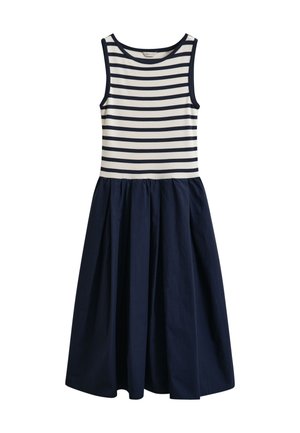 Robe sans manches avec un corsage blanc et bleu marine à rayures horizontales ajusté et une jupe évasée unie bleu marine.