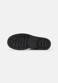 MICHAEL Michael Kors Bottes en caoutchouc - black