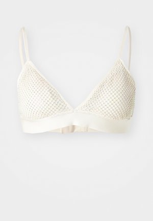 Triangel-Bralette i kremfarge med mesh-overlegg, myk underdel, justerbare stropper og glitrende detaljer over koppene.
