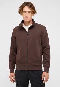 Brown zip-up sweatshirt made of soft material, featuring a high collar, ribbed cuffs, and a small logo on the chest.