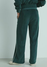 Next JOGGERS - Treniņtērpa apakšdaļas - green