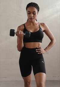 Puma MOVE SHAPELUXE SEAMLESS - Lengvai krūtinę prilaikanti sportinė liemenėlė - black