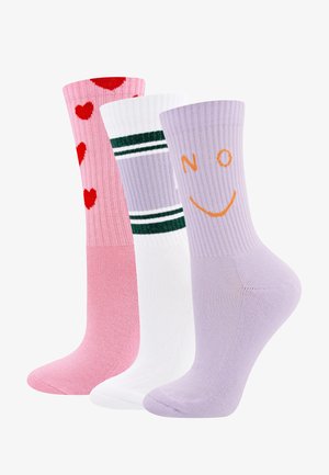 Three colorful crew socks: pink with red hearts, white with green stripes, and lavender with an orange smiley face and "NO" text.