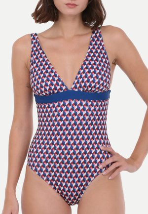 Maillot de bain une pièce avec un motif géométrique rouge, bleu et blanc, doté d'un décolleté en V profond et d'une taille unie bleue.