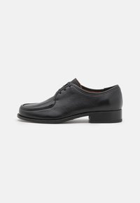 Atlasīts, black