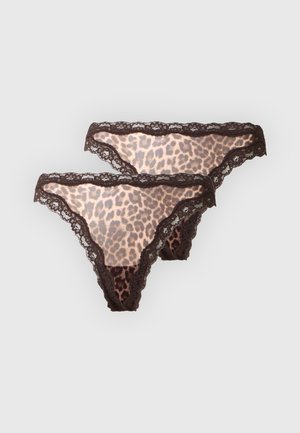 To par leopardprintede dametrusser med sort blondestrim på en lys baggrund.