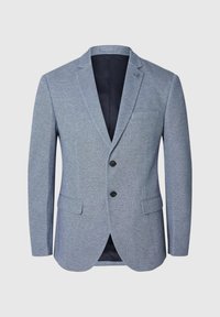 Blazer bleu clair en tissu texturé, avec deux boutons noirs, des revers crantés et des poches latérales. Présente un intérieur foncé contrastant.
