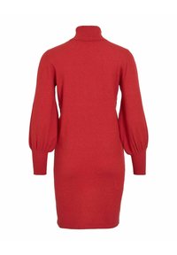 Vestido suéter rojo con cuello alto, mangas largas abullonadas y puños acanalados. Textura suave y silueta ajustada, cae por encima de la rodilla.