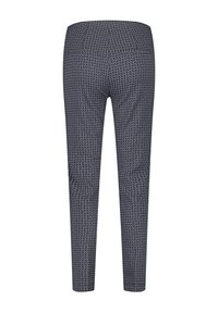 Pantalon slim bleu marine avec petit motif losange blanc, vue de dos, longueur cheville avec deux poches passepoilées arrière.