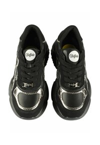 Black sneakers with a textured upper, featuring metallic accents, round logo, and thick soles. Laces and reinforced stitching visible.