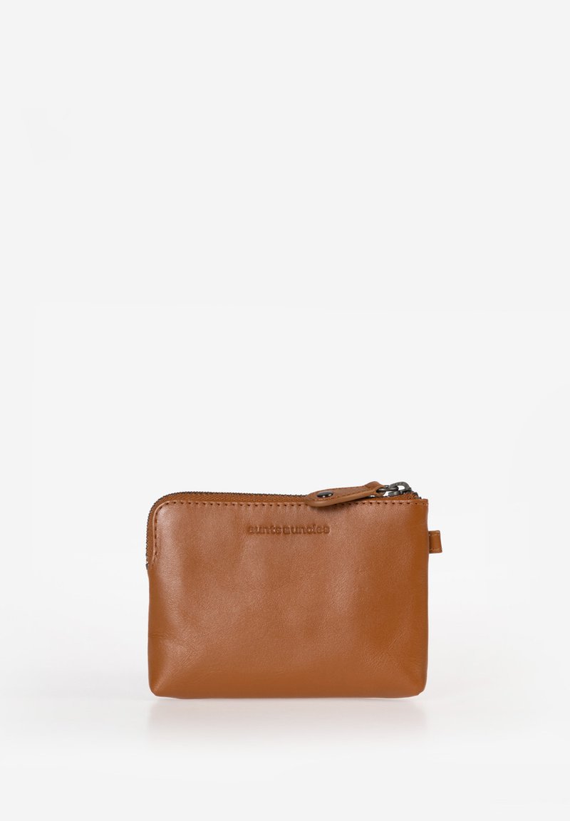 Brown leather zip pouch with a smooth texture, rounded edges, and a small loop for attachment. Features embossed logo on the front.