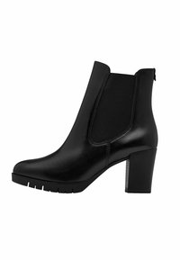 Bottine en cuir noir avec panneaux élastiques sur les côtés, talon carré et semelle texturée. Elle présente un design épuré et une finition lisse.