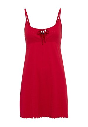 Red sleeveless mini dress with thin straps, a small front tie at the neckline, and a ruffled hem.