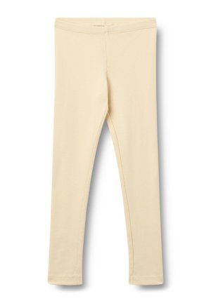 Kremowe prążkowane legginsy dziane z elastycznym pasem, dopasowane, długości do kostek, prezentowane na białym tle.