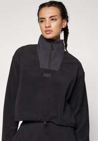 Helly Hansen DAYBREAKER CROPPED  - Pulover iz flisa - black