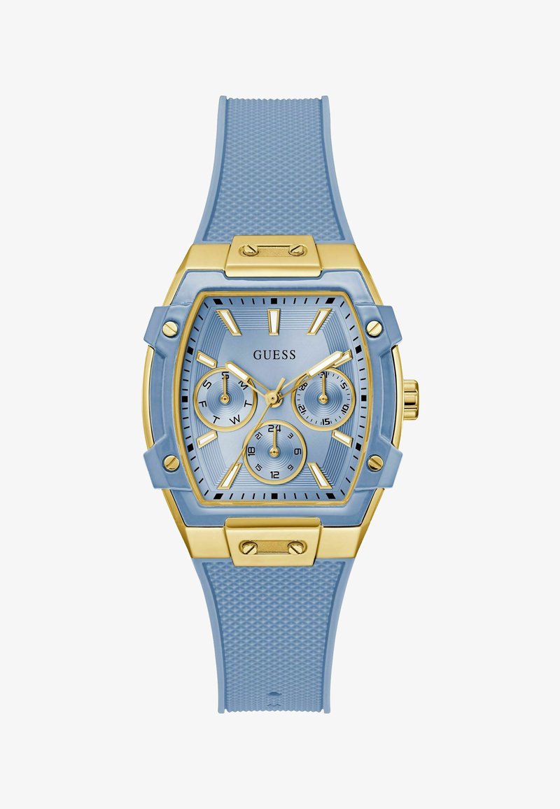 Orologio in silicone blu con cassa quadrata color oro, tre quadranti secondari, cinturino testurizzato e logo "GUESS" sul quadrante. Dettagli e lancette dorate.