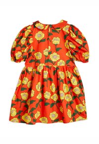 Oranžové bavlněné šaty s květinovým vzorem žlutých květin a zelených listů, s nafouknutými rukávy a kulatým límcem. Zapínání na knoflíky vzadu.