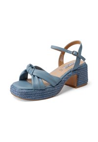 Sandali piattaforma blu con suola intrecciata, caratterizzati da un design a strap con nodo e una cinghia alla caviglia regolabile. Realizzati in materiale sintetico morbido.