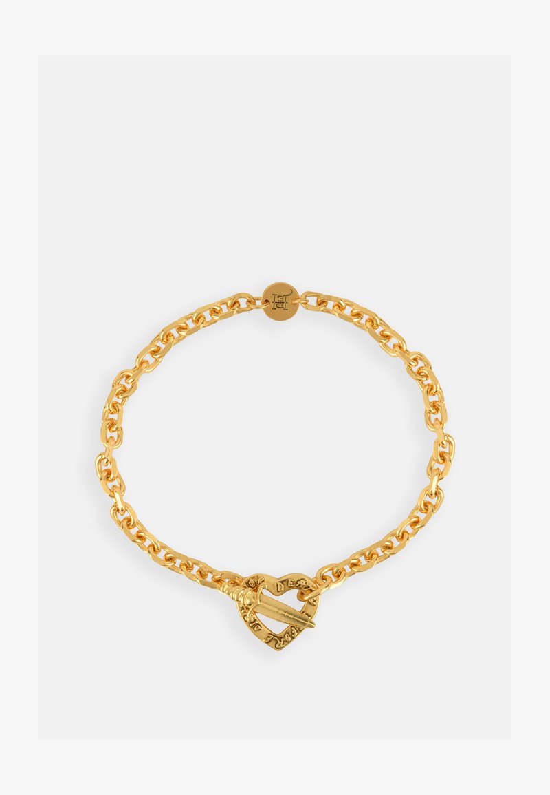 Gold-tone bracelet featuring a linked chain design and a heart-shaped clasp with engraved lettering and a distinctive pin closure.