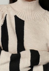 Next Neule - beige