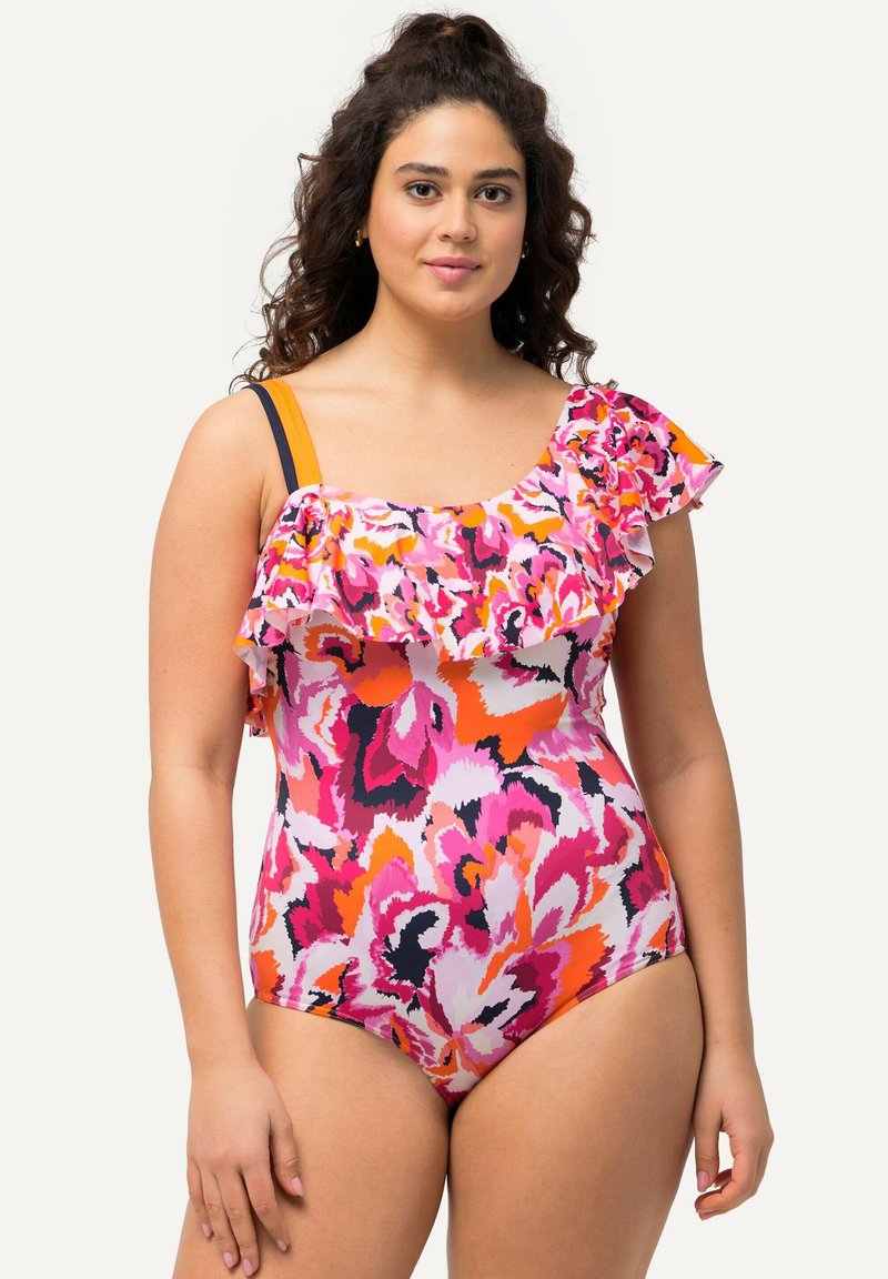 Fuksiavärinen uimapuku, jossa on röyhelökaula-aukko, abstrakti kukkakuosi vaaleanpunaisessa, oranssissa ja valkoisessa, sekä kontrastiväriset olkaimet.