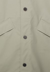 Rains LONG JACKET UNISEX - Parca - cement
