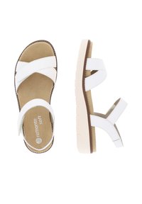 Sandales blanches avec des brides croisées en matériau synthétique. Semelle intérieure moulée et semelle extérieure texturée. Design léger et flexible pour le confort.