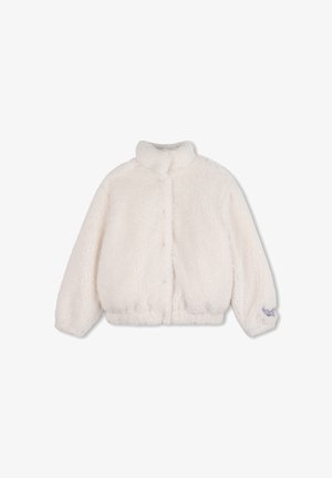 Veste en polaire blanche et duveteuse avec manches longues et col montant, présentant un petit détail brodé sur le poignet gauche.