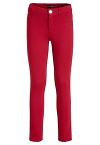 Punaiset slim-fit-housut etupainikkeella ja taskuilla, suunniteltu naisille, esillä valkoista taustaa vasten.