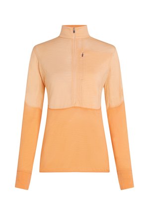 Långärmad orange tröja med kvartdragkedja och bröstficka med dragkedja i lättviktsmaterial.