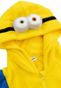 Felpa gialla in pile con zip, caratterizzata da un design di occhio grigio con accenti verdi e arancioni, e una striscia nera sul cappuccio.