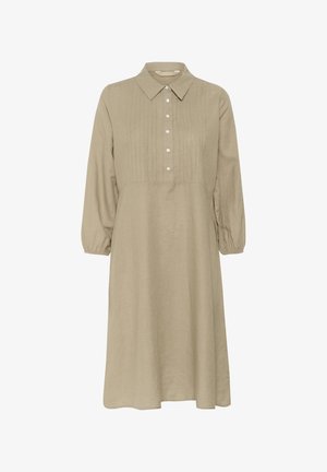 Khaaki lanena haljina s ovratnikom, dugim napuhanim rukavima, prednjim dugmadi i vertikalnim prugama za teksturu. Opušteni kroj i srednja dužina.