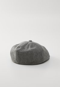 Gray wool beret with a rounded shape, featuring six sections and a small top button, showing a soft texture and even stitching.