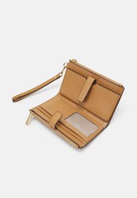 MICHAEL Michael Kors WRISTLET - Pénztárca - pale peanut