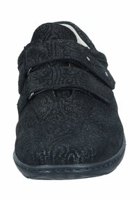 Black footwear with a textured pattern, featuring two adjustable Velcro straps. Soft materials and a cushioned interior for comfort.