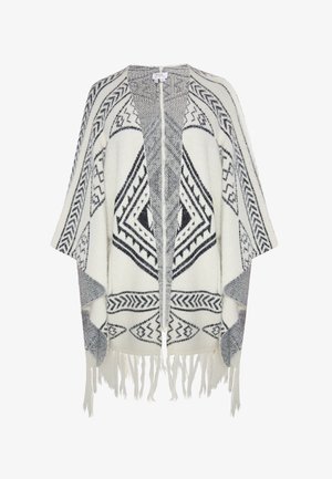 Szydełkowany ponczo w białym kolorze z czarnymi geometrycznymi wzorami, z otwartym przodem, szerokimi rękawami i frędzlami na dolnej krawędzi. Miękka tekstura i oversize'owy krój.