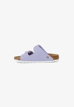 Purple canvas slide sandal with a cork footbed, open design, and white rubber outsole. Features an adjustable strap with metal accents.