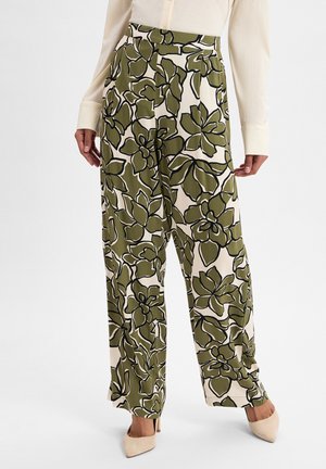 Green and cream floral wide-leg pants with a black outline; lightweight fabric; high-waisted design; prominent flower pattern throughout.