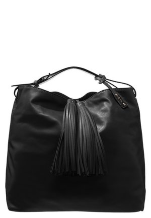 Sac à main en cuir noir avec une bandoulière unique et deux longues pampilles en cuir suspendues au centre devant.