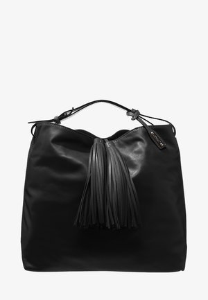 Sac à main en cuir noir avec une bandoulière unique et deux longues pampilles en cuir suspendues au centre devant.