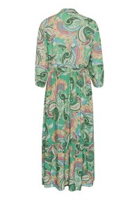 Dolga zelena obleka z vzorcem paisley v roza, modri in bež barvi. Ima ovratnik, dolge rokave in pasni trak.